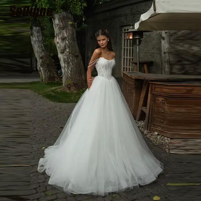 Robes de mariée SoDigne en dentelle/tulle coupe trapèze, épaules dénudées, sans manches, collection 