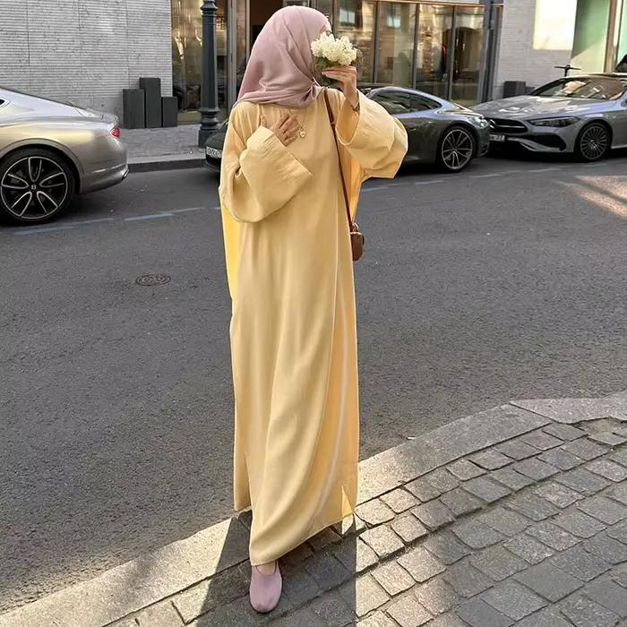 Robe longue musulmane élégante pour femmes, mode col rond, manches longues évasées, taille ajustée, 