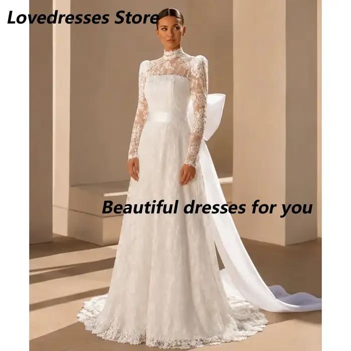 Robe de mariée personnalisée en dentelle coupe A-line, col montant, manches longues, avec nœuds et b