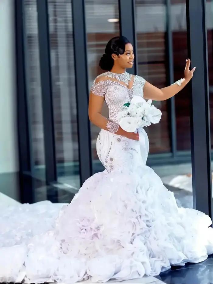 Robes de mariée sirène africaines 2026 de luxe avec cristaux brillants, perles, manches longues en m