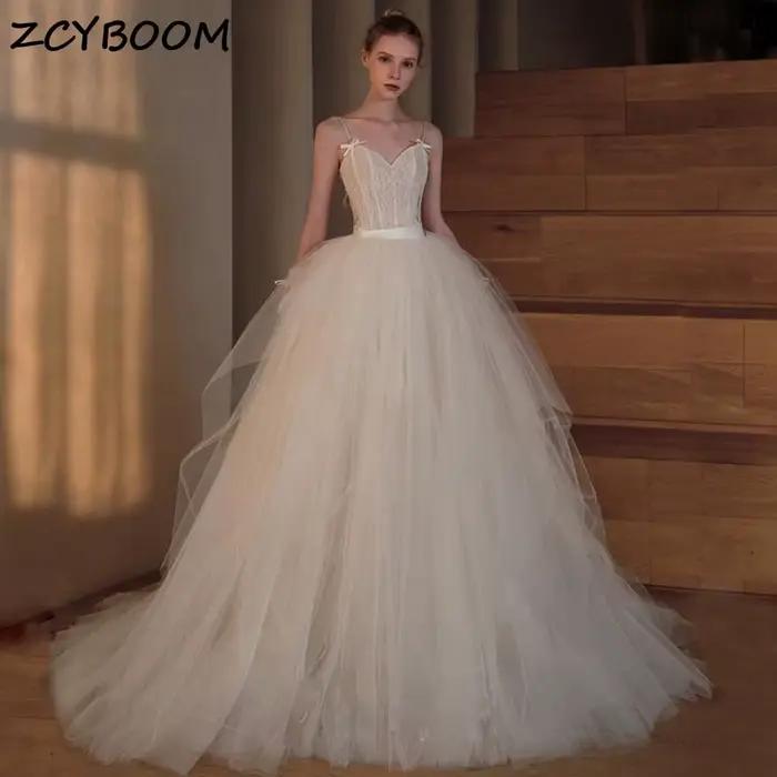 Robes de mariée rétro à bretelles spaghetti avec nœud en dentelle romantique à la française, coupe t