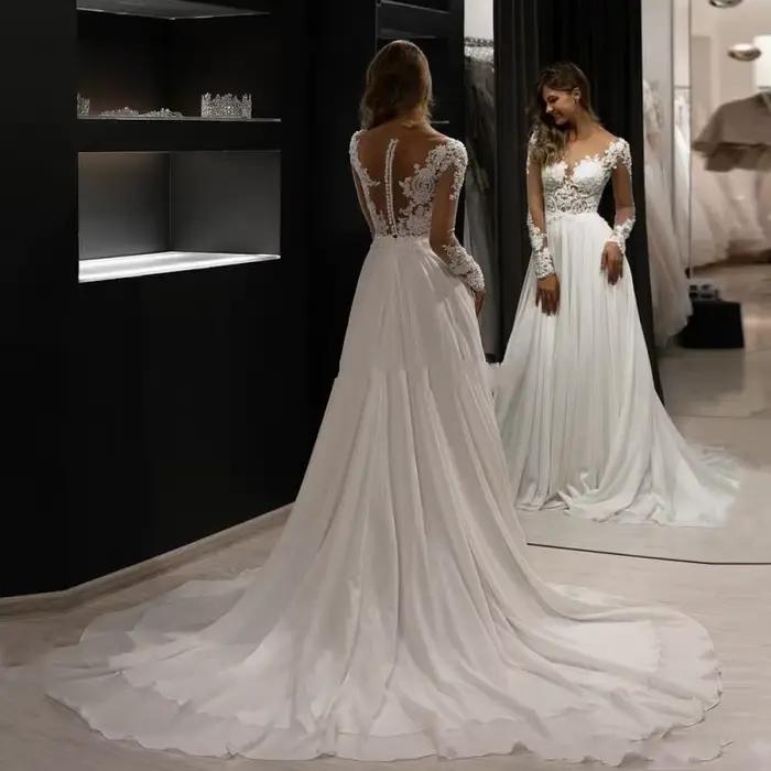 Robe de mariée en dentelle à manches longues