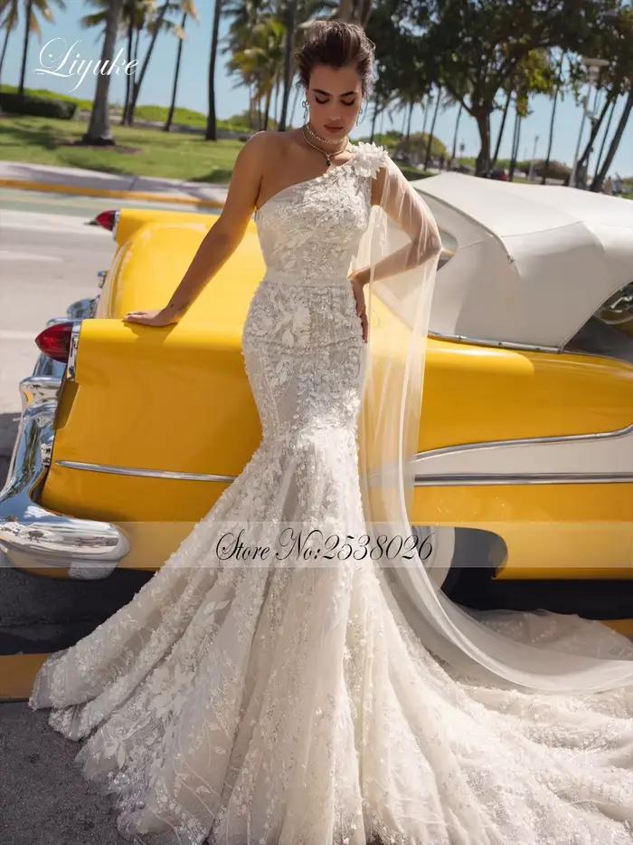Liyuke sur mesure robe de mariée sirène exquis tissu de dentelle florale superbes fleurs 3D asymétrique une épaule robes