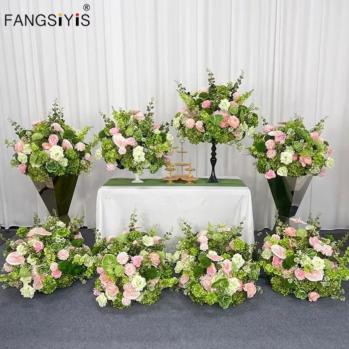 Décoration de mariage : rangée de fleurs, centre de table, arrangement vert et rose, toile de fond, arche, décoration florale pour événements et fêtes