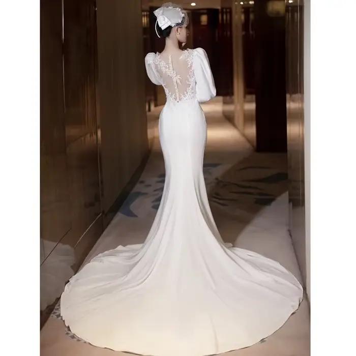 Robe de mariée sirène en polyester et coton avec décolleté en V et train de balayage pour femmes occasions spéciales comme mariage et banquets