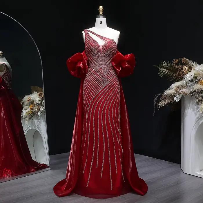 Robe de soirée Sharon Said Dubai rouge à une épaule avec manches bouffantes et perles شارون سعيد
