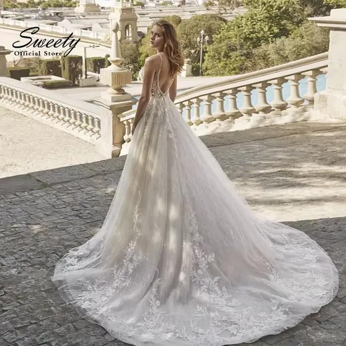 Robe de mariée en dentelle brodée sur filet