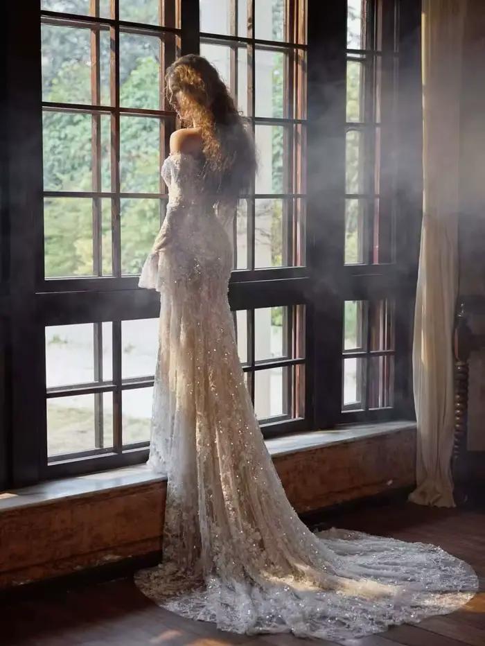 Robe de mariée sirène luxueuse sur mesure à manches longues pour femme