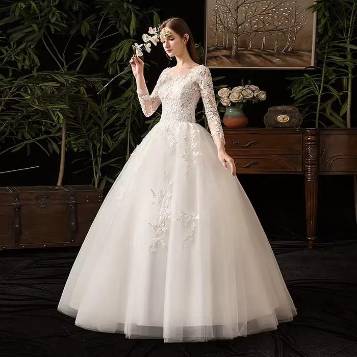 Robes de mariée en dentelle à manches longues
