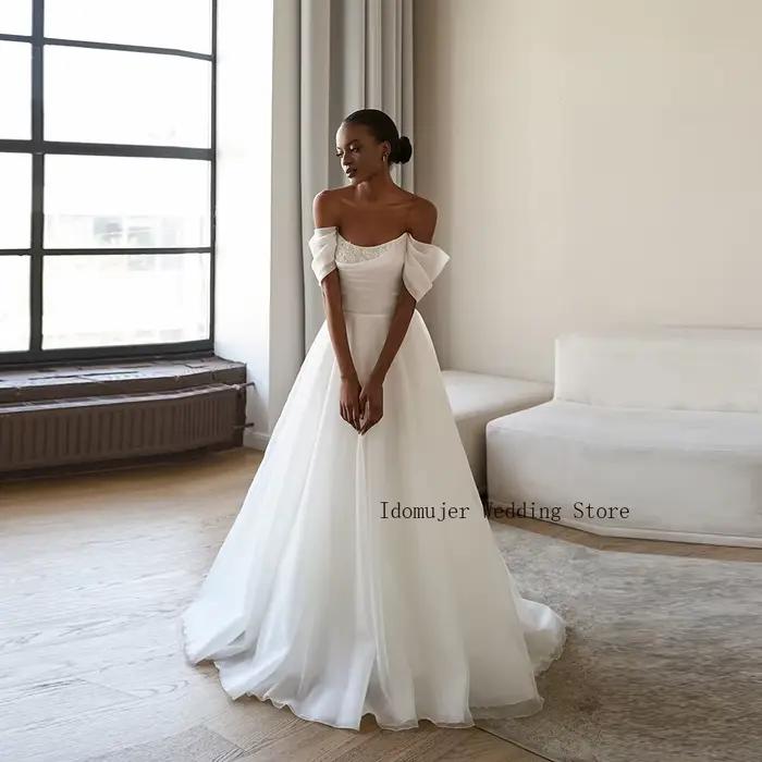 Robe de mariée élégante en tulle à épaules dénudées