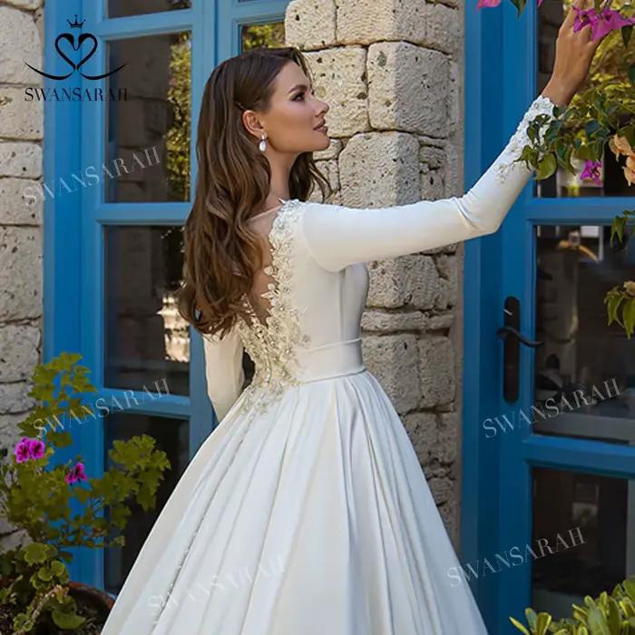 Robe de mariée SwanSarah en satin à manches longues 2026