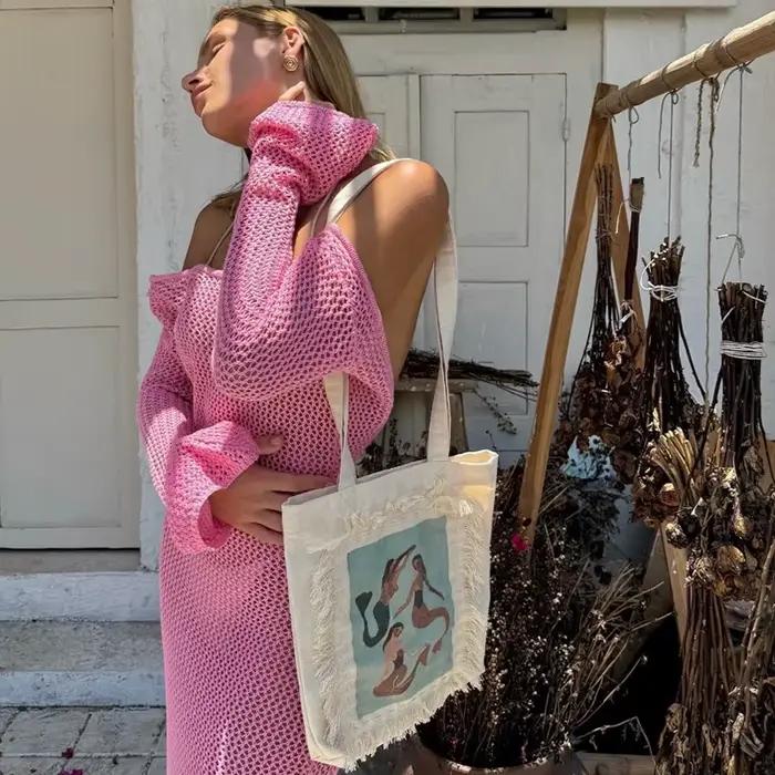Robe longue en tricot dos nu avec fente latérale