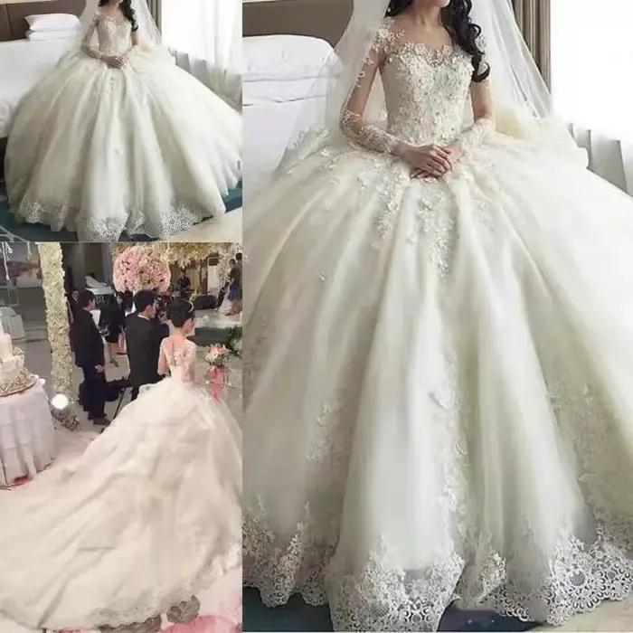 Robe de mariée en dentelle à manches longues
