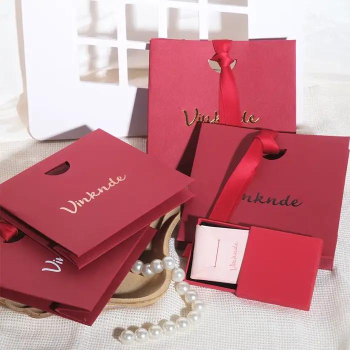 Sac en papier rouge personnalisé avec logo pour bijoux, shopping, mariage, voyage, cadeau, pochette pour bagues, boucles d'oreilles, bracelets, pendentifs, parfums, gâteaux, rangement