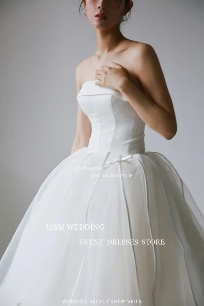 LISM élégant bretelles une ligne corée robes de mariée fée Tulle arc robe