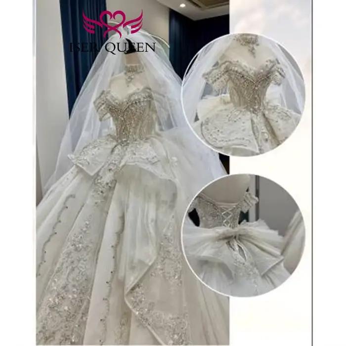 Robe de mariée royale personnalisée avec perles lourdes