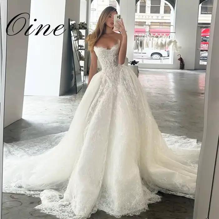 Oine Exquisite Nouveauté 2026 Robes de mariée coupe A-line plissées, ornées de perles et de dentelle