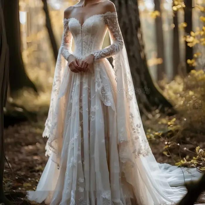 Robe de mariée médiévale de la Renaissance avec manches cape épaules dénudées, dentelle, coupe trapè