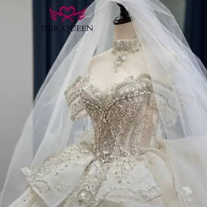 Robe de mariée royale personnalisée avec perles lourdes