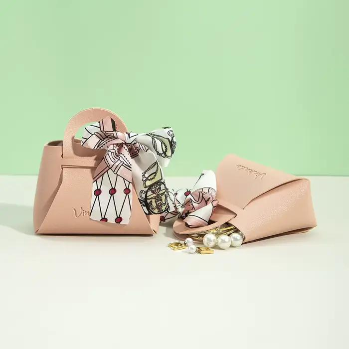 Sac cadeau en cuir avec logo personnalisé avec ruban, boîte à bonbons de mariage, décor Eid Mubarak, petit cadeau portable, sac à main d'emballage de bijoux en PU