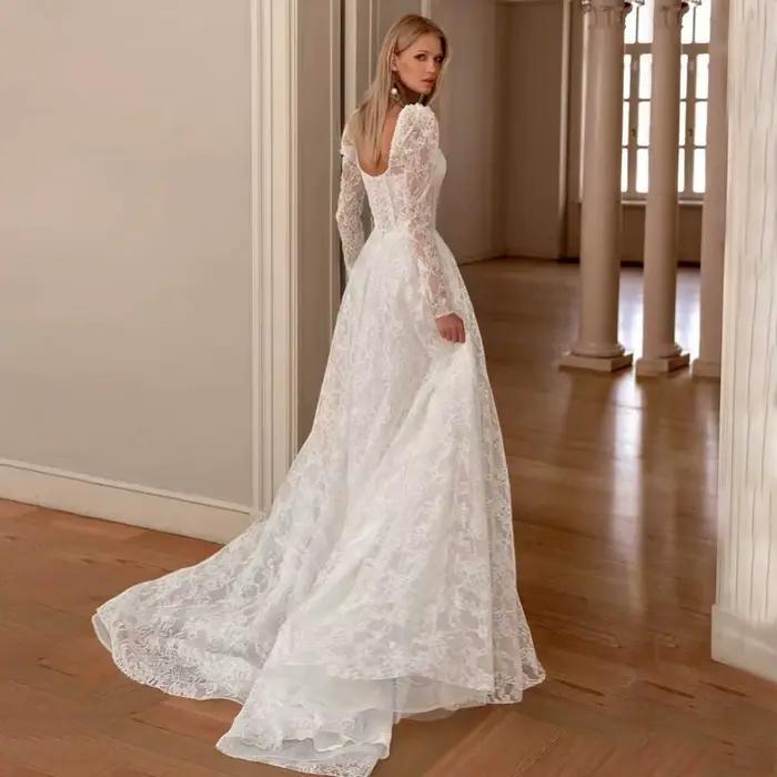 Robes de mariée élégantes en dentelle à manches longues