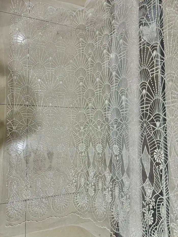 Tissu doré brodé pour robe de mariée