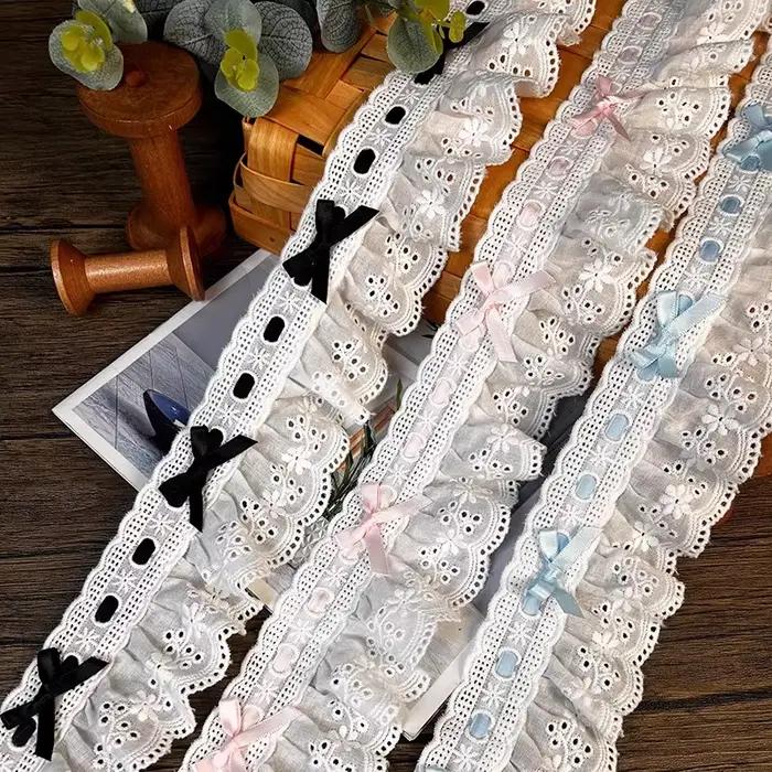 Robe de mariée plissée en dentelle tissée avec nœud
