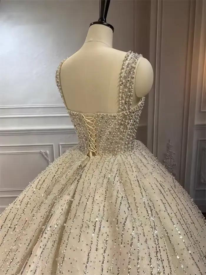 Robes de mariée personnalisées luxueuses à sequins et cristaux scintillants