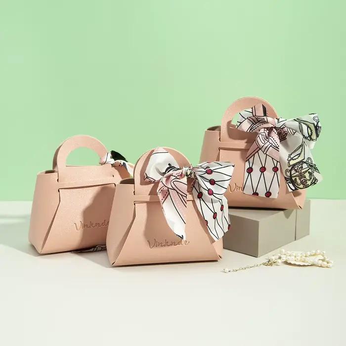 Sac cadeau en cuir avec logo personnalisé avec ruban, boîte à bonbons de mariage, décor Eid Mubarak, petit cadeau portable, sac à main d'emballage de bijoux en PU