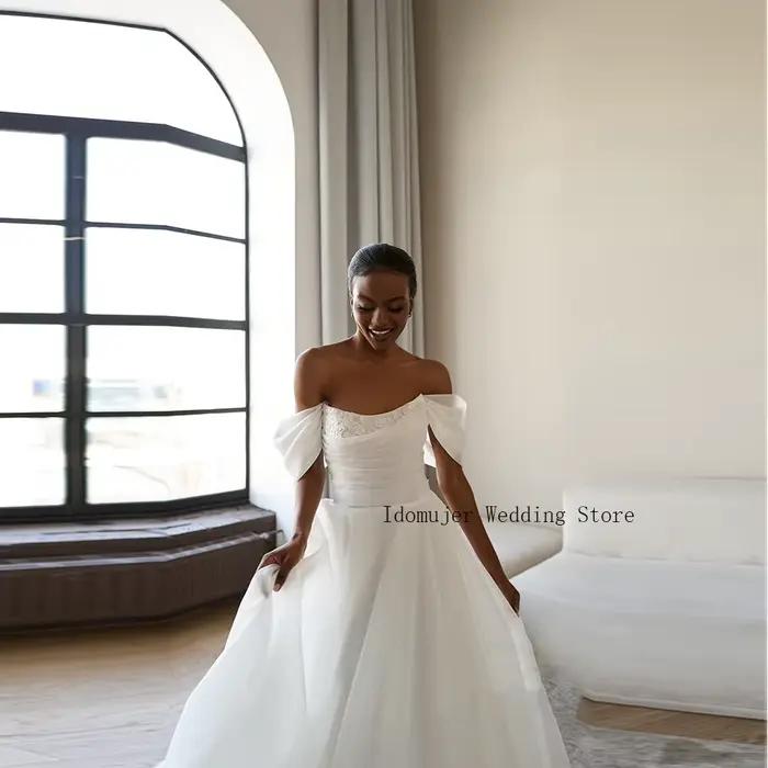 Robe de mariée élégante en tulle à épaules dénudées
