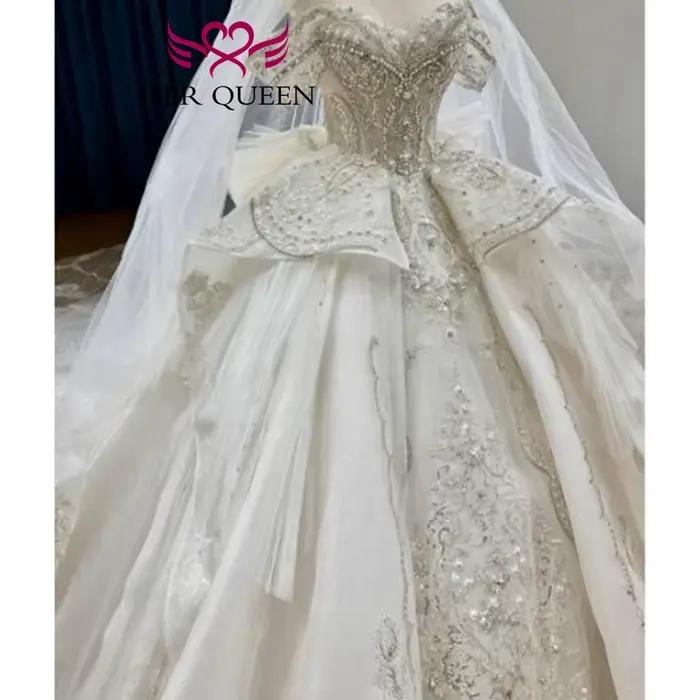 Robe de mariée royale personnalisée avec perles lourdes