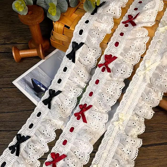 Robe de mariée plissée en dentelle tissée avec nœud