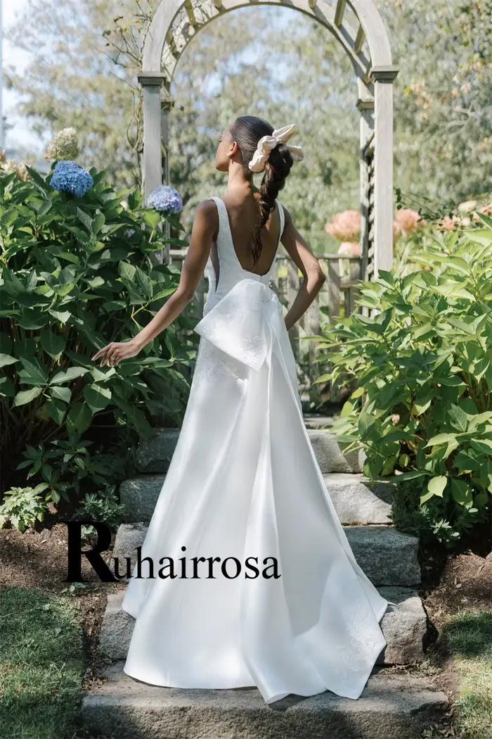Ruhair robe De mariée tendance pour les femmes Appliques bretelles Spaghetti nœud dos nu a-ligne robes De Novia Brautmode personnalisé