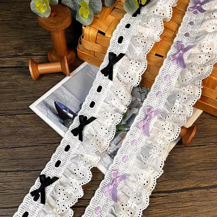 Robe de mariée plissée en dentelle tissée avec nœud