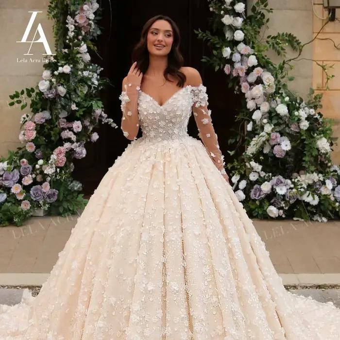 Robe de mariée à manches longues 2026 romantique perlée 3D fleurs
