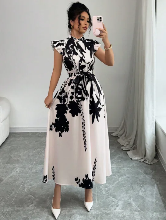 Robe élégante noire et blanche pour femme, idéale pour le travail, les rendez-vous et les vacances