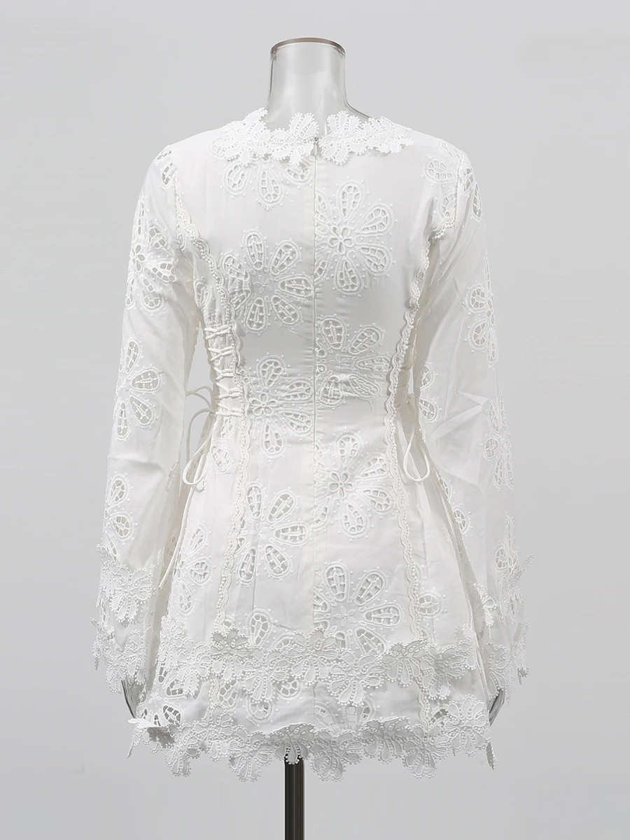 TWOTWINSTYLE solide évider Mini robes pour femmes col en V longue sans manches taille haute tempéram