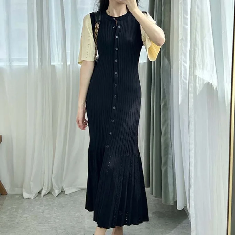 Robe tricotée française ajourée à la mode, style d'été, amincissante, ligne a, manches courtes, robe
