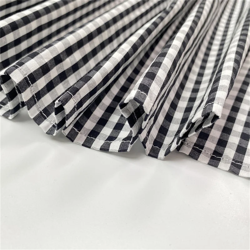 Yeezzi 2025 nouvelle mode Plaid revers chemise robe femmes manches à volants poches boutonnées fente