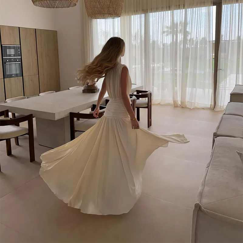 Robe longue élégante blanche sans manches pour femme, col en V profond, drapée, plissée, pour l'été,