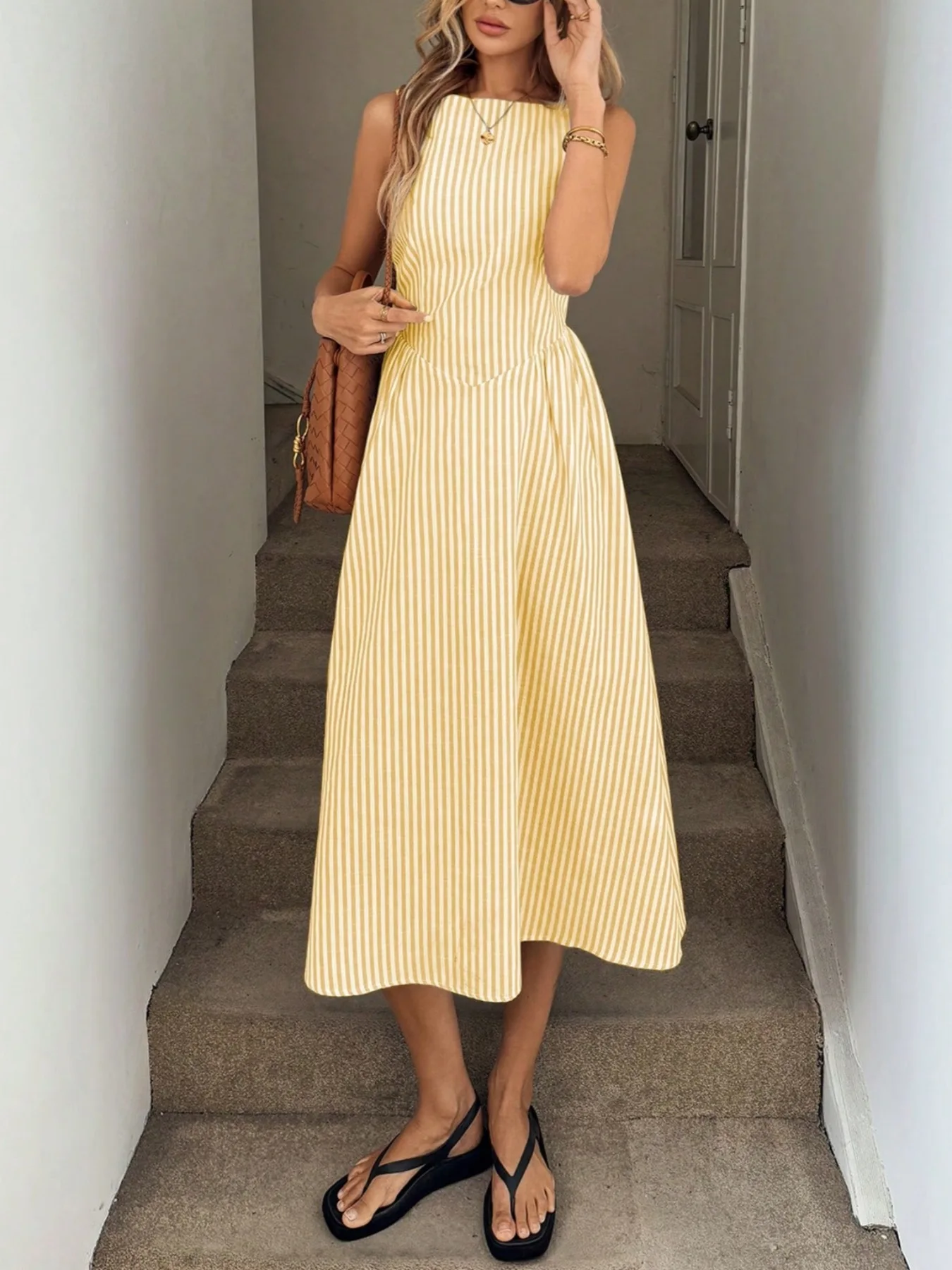 Robe d'été amincissante sans manches à rayures verticales, fraîche, tempérament élégant, nouvelle co