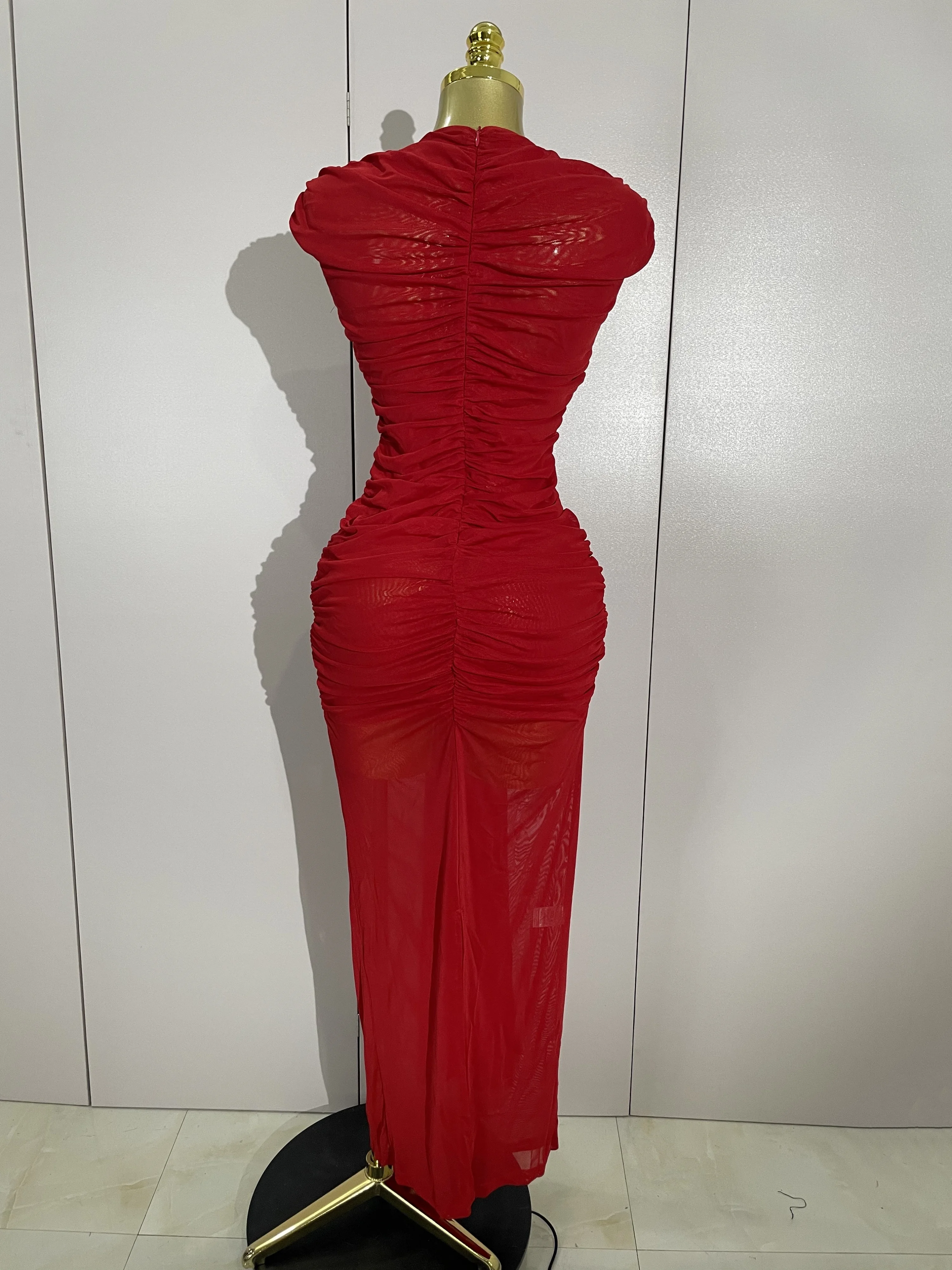 Femmes Sexy sans manches col rond évider maille moulante longue robe défilé de mode célébrer célébri
