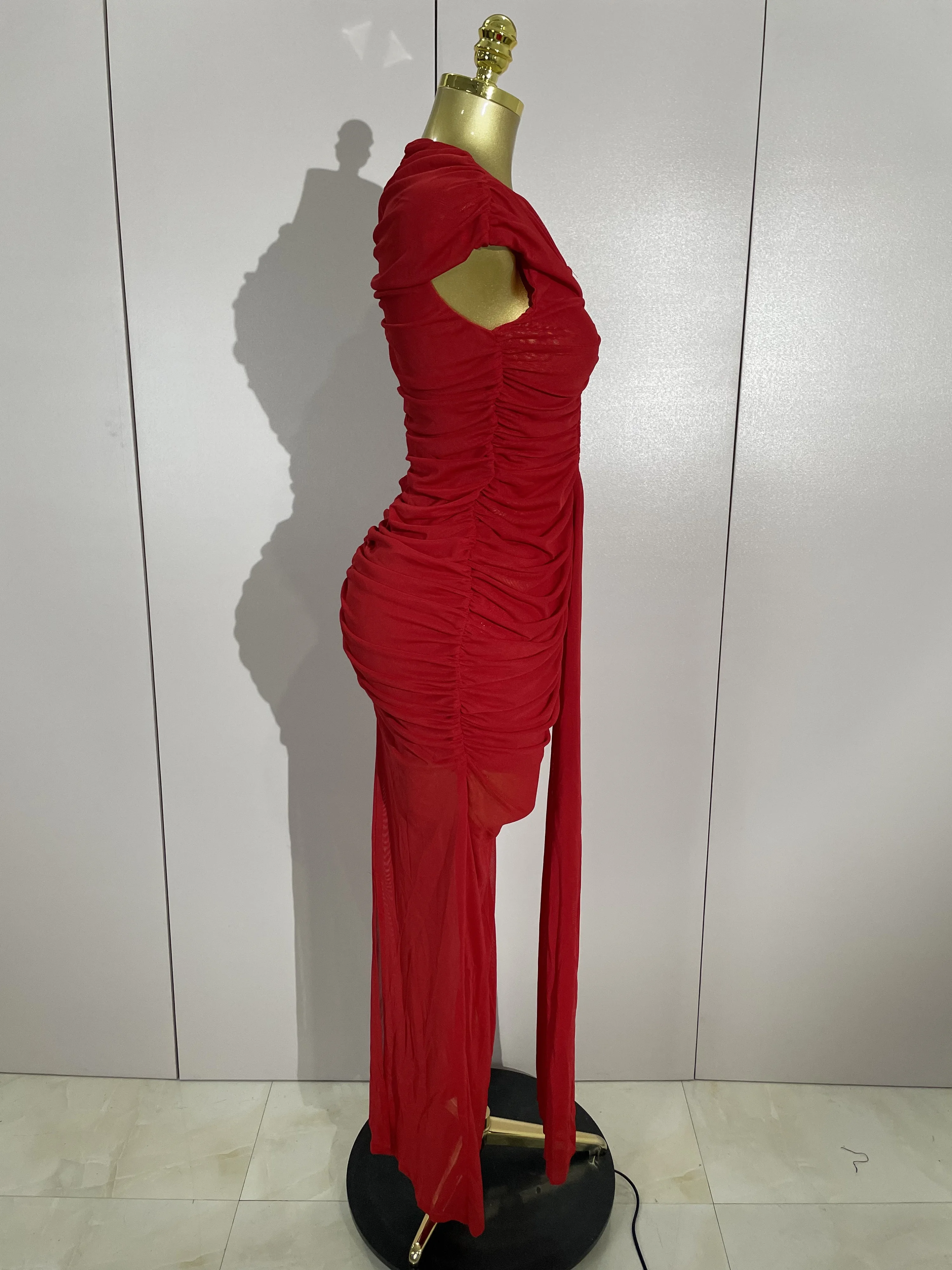 Femmes Sexy sans manches col rond évider maille moulante longue robe défilé de mode célébrer célébri